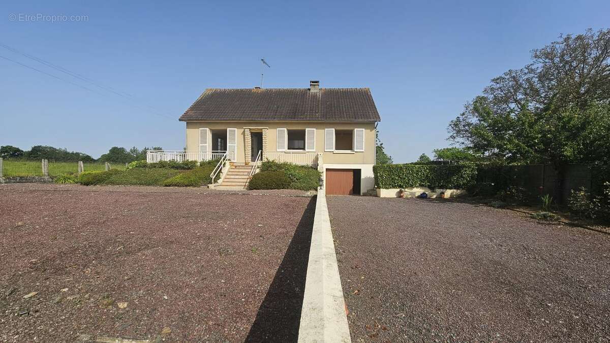 Maison à CAVIGNY