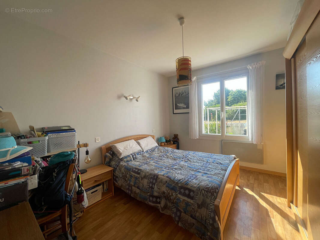 Maison 3 chambres avec véranda, garage et terrain de 578 m²  - Environnement calme - photo 10