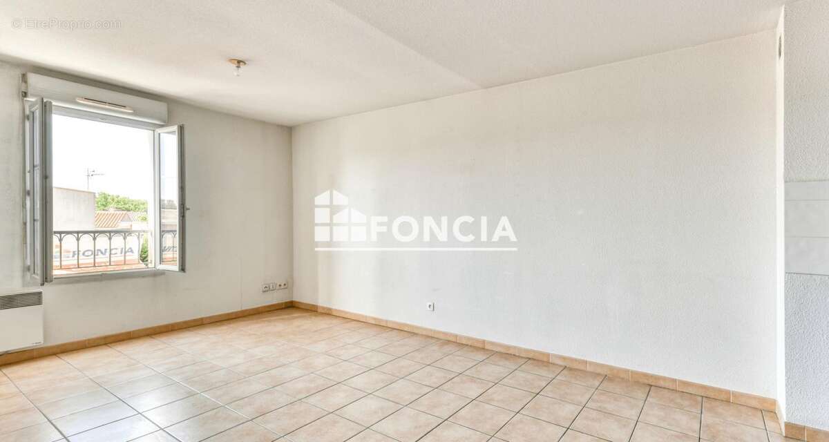 Appartement T3 avec place de parking - photo 3