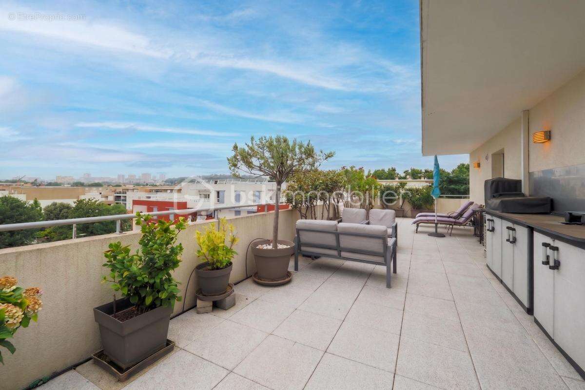 NÎMES CAPOUCHINÉ – Superbe T4 de 96 m² avec Terrasse d'Exception de 57 m² ! - photo 2