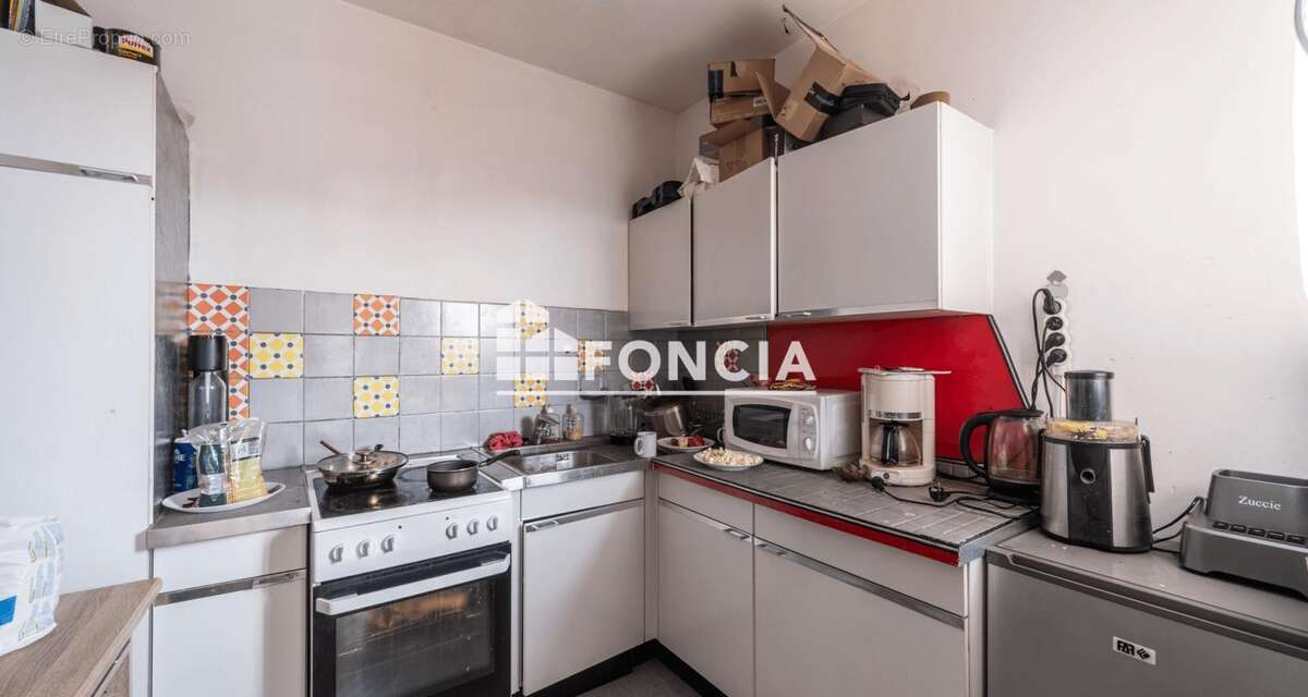 Investissement 12,9% DE RENTABILITE : Studio 32m² avec balcon et locataire en place - photo 3
