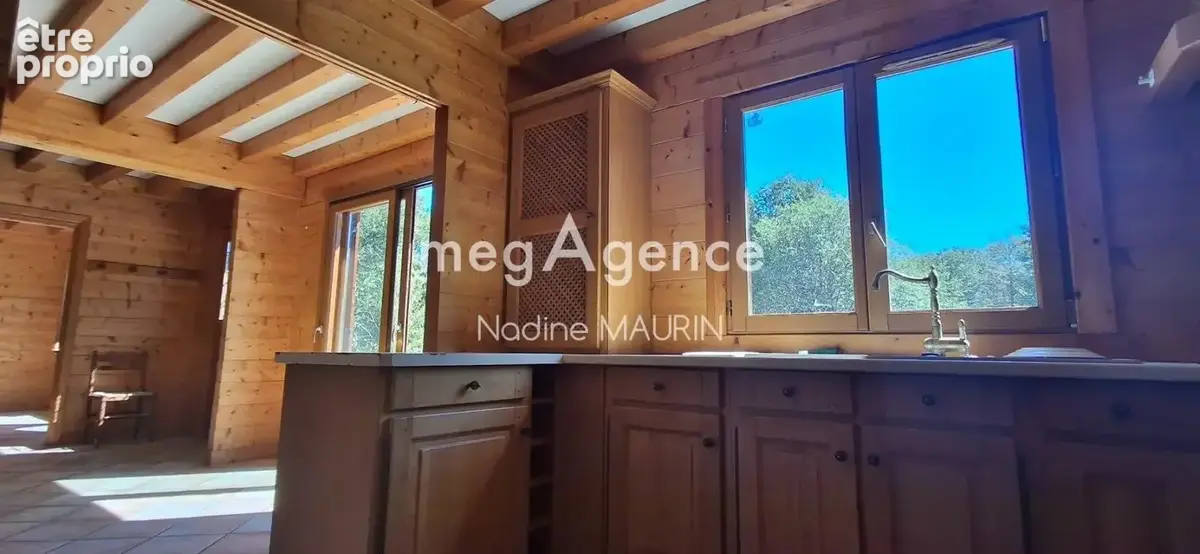 Chalet en bois de 138 m² de 4 chambres sur un terrainde 73862m² - photo 9