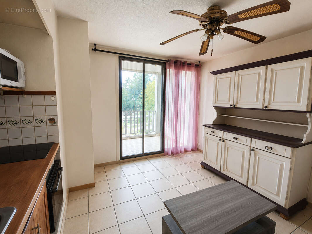 Appartement  de type 2 en rez de jardin - photo 4