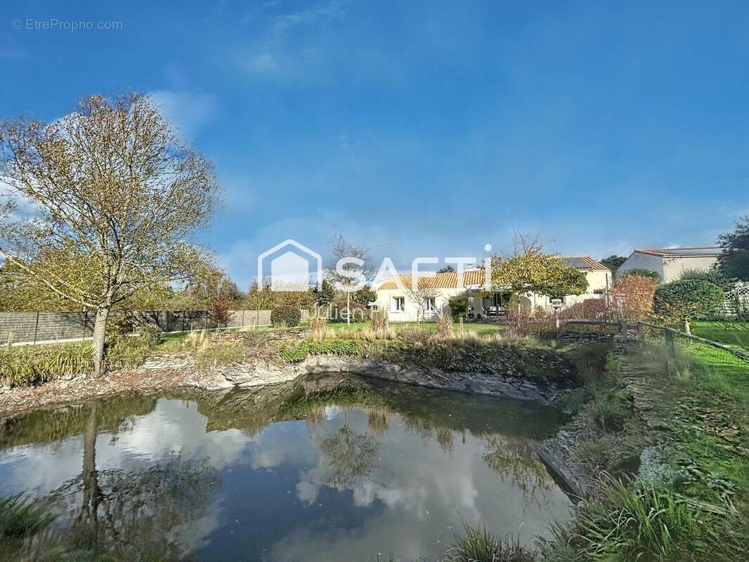 Photo 1 - Maison à SAINT-JULIEN-DE-CONCELLES