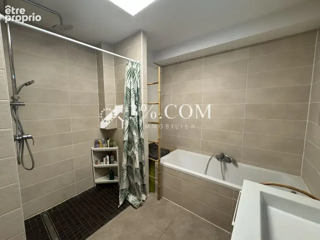 3%COM appartement F3 en rez de jardin - garage- parking - photo 11