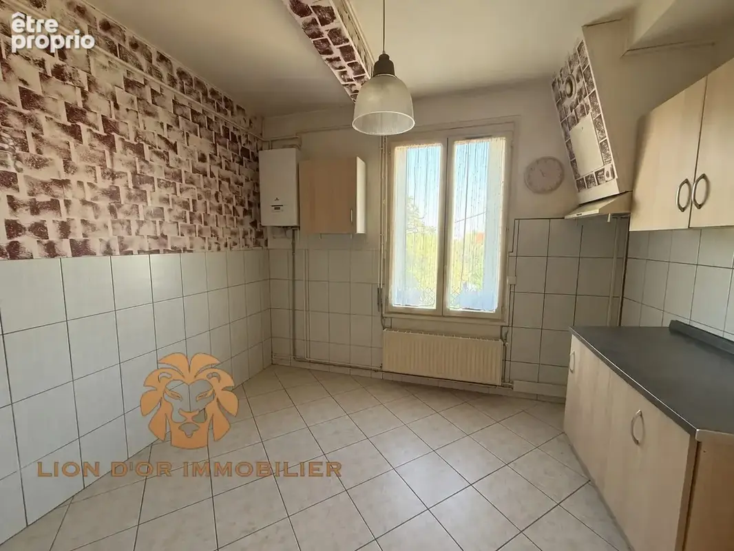 Appartement 3 pièces 62 m² à vendre à Neuville-Sur-Saone (69250) - photo 2