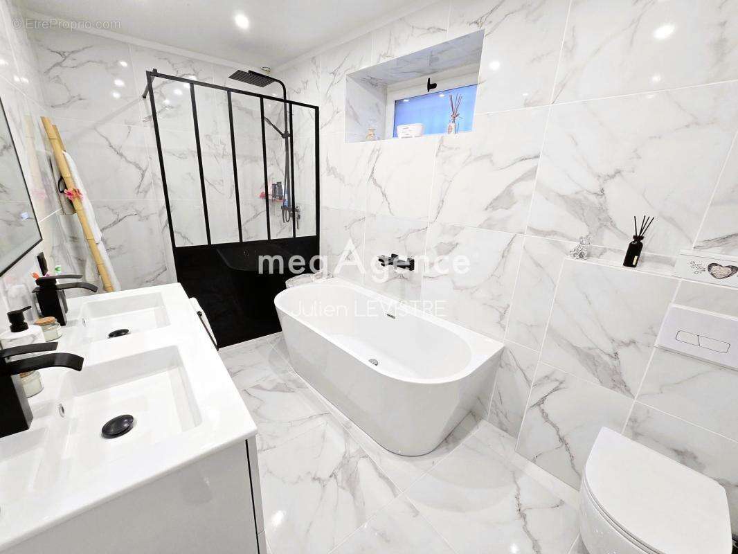 Maison de 4 pièces de 102m² - photo 6