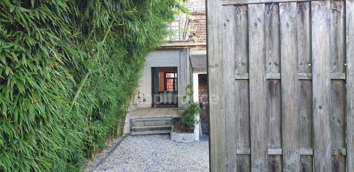 Maison de 1930 pleine de charme avec jardin, terrasse couverte et 4 chambres à Valenciennes (59) - photo 6