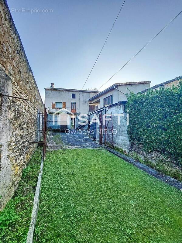 Photo 1 - Maison à TOUVRE