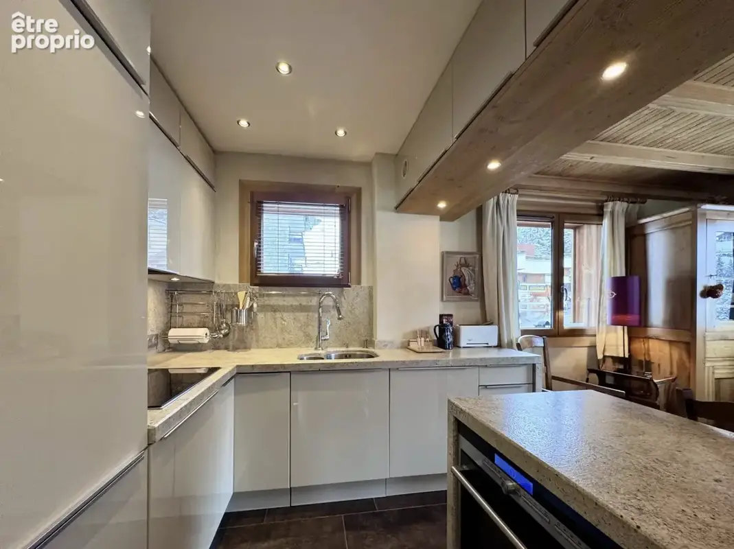 Skis aux pieds - chalet 4 appartements + 5 garages - terrain 915 m2 - photo 6