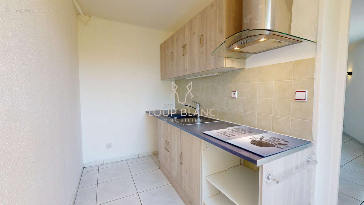 Appartement T2 - Centre-Ville SOCHAUX - photo 4