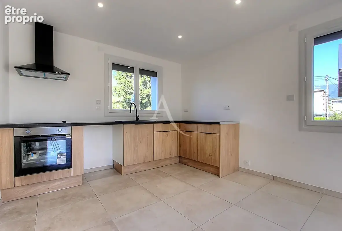 Appartement  4 pièces 74 m2 avec garage, place de parking et jardin - photo 3