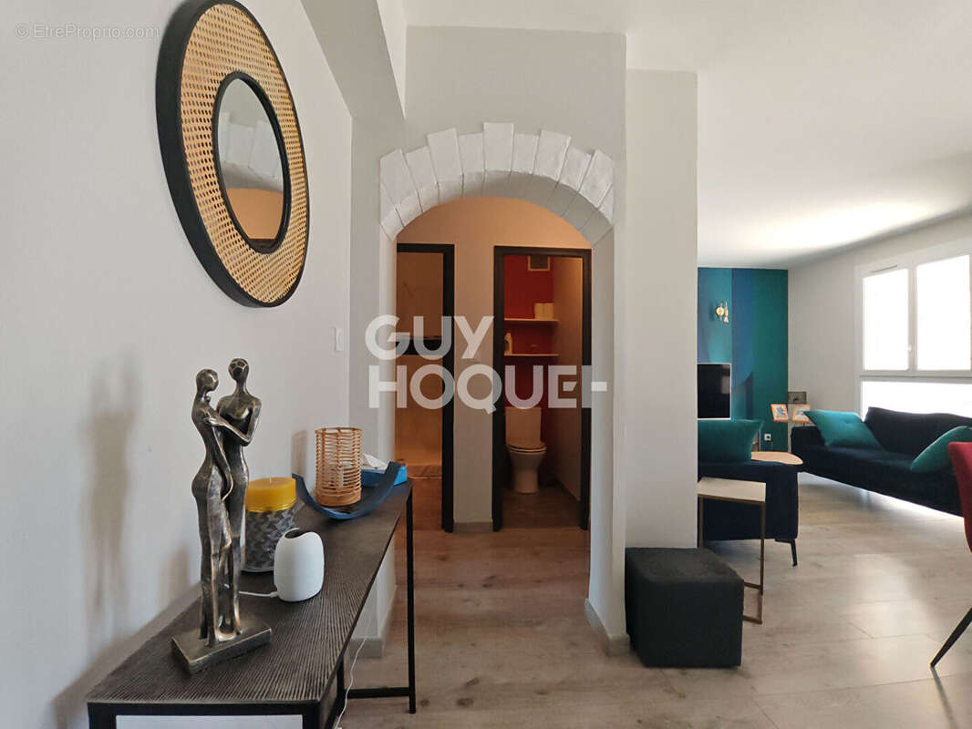 Magnifique T4 de 87m² avec terrasse de 80m² - Proximité Centre-ville - Résidence sécurisée avec ascenseur et garage ! - photo 2