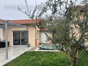 Maison à SAINT-GENIS-LES-OLLIERES