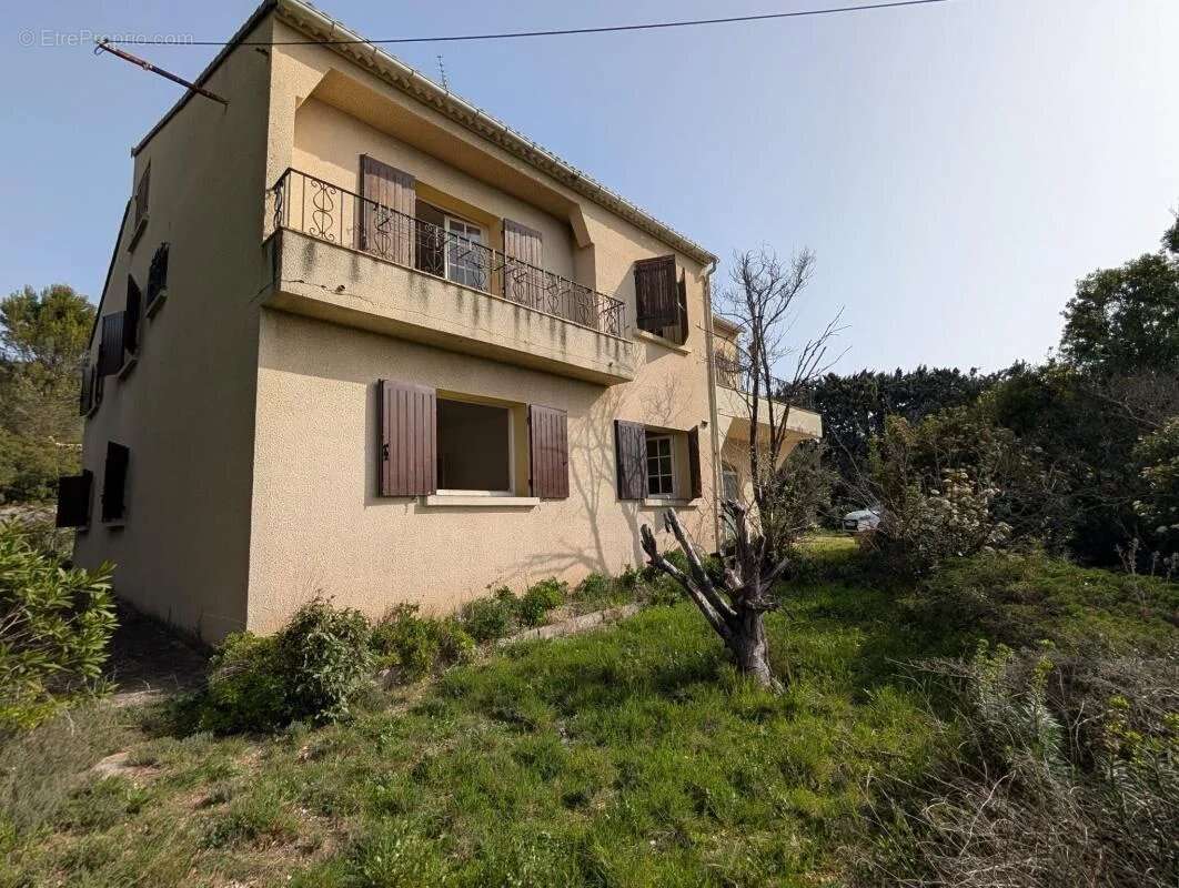 Maison à SAINT-HILAIRE-D'OZILHAN