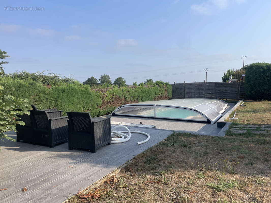 Maison de plain-pied de type 5 de 115 M2 avec piscine sur 697 M2 - photo 2