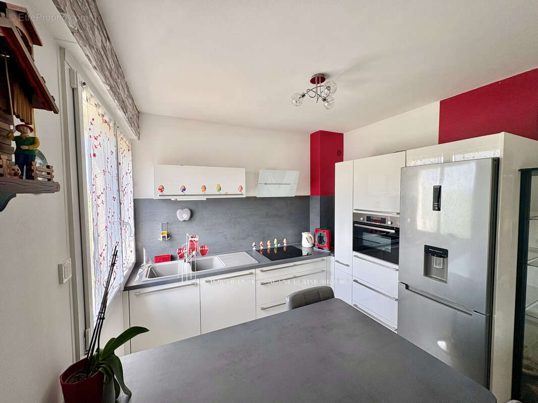 Appartement T2 Ascenseur et Clim - Agence Immocenter Chanas - photo 4