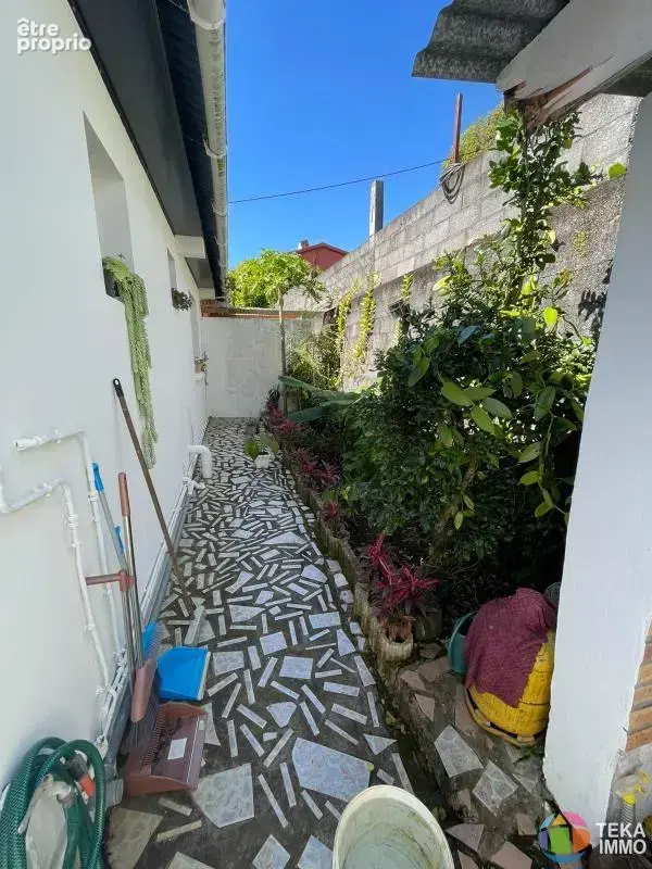 FABIEN TEKA IMMO vous propose à la vente une maison F4 mitoyenne située à Sainte Marie dans le quartier de Beaumont, ile de la R - photo 7