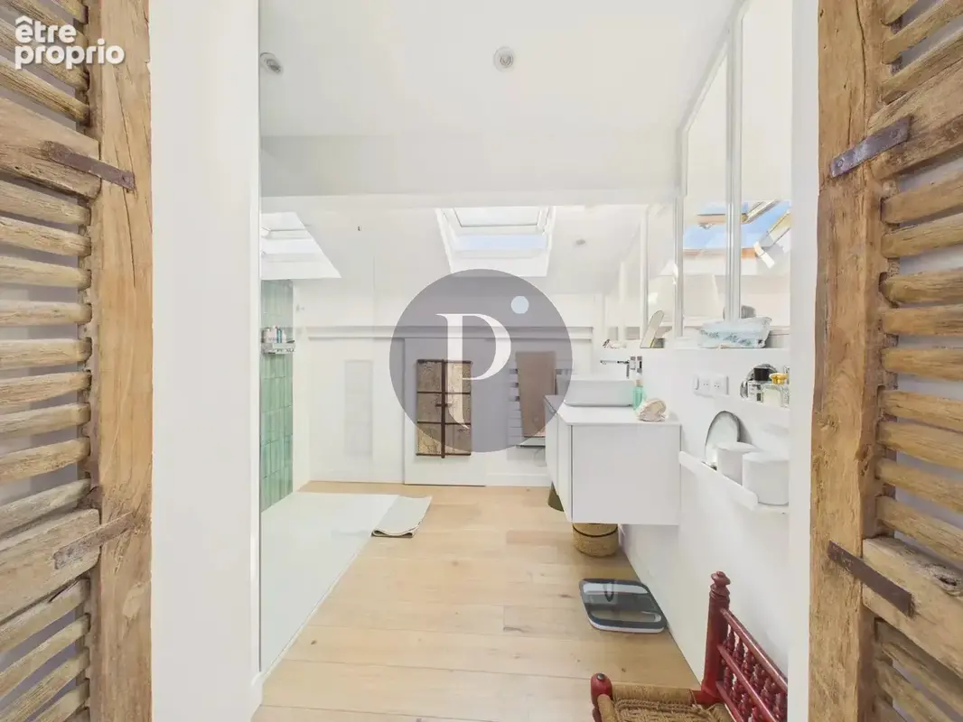 La surprise sous les toits : duplex style loft exceptionnel. - photo 15