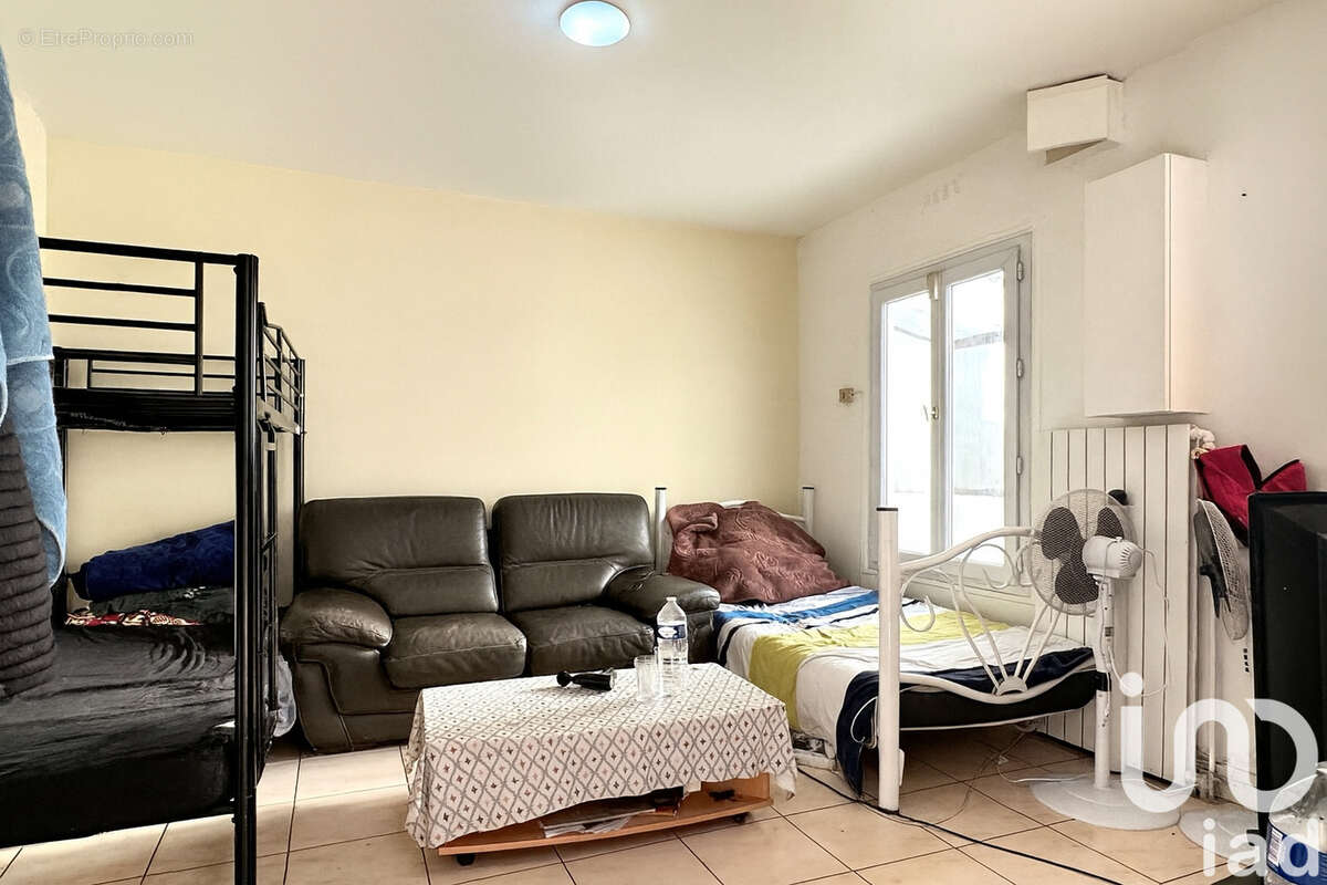 Photo 2 - Maison à LA COURNEUVE