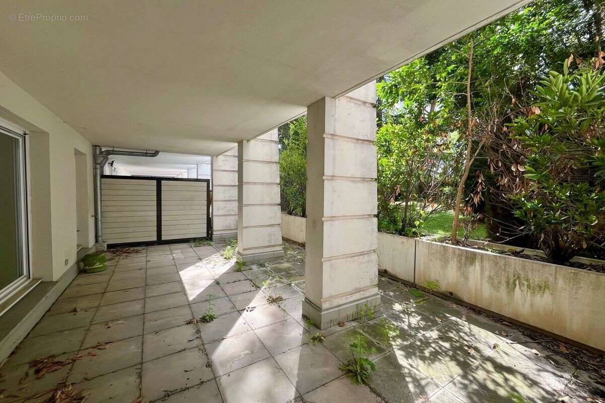 Belle opportunité E02150116L- Spacieux T3 de 76m² possibilité T4 en RDC avec terrasse de 38m² vue sur jardin - photo 8