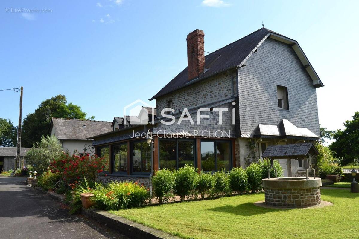 Photo 1 - Maison à AMBRIERES-LES-VALLEES