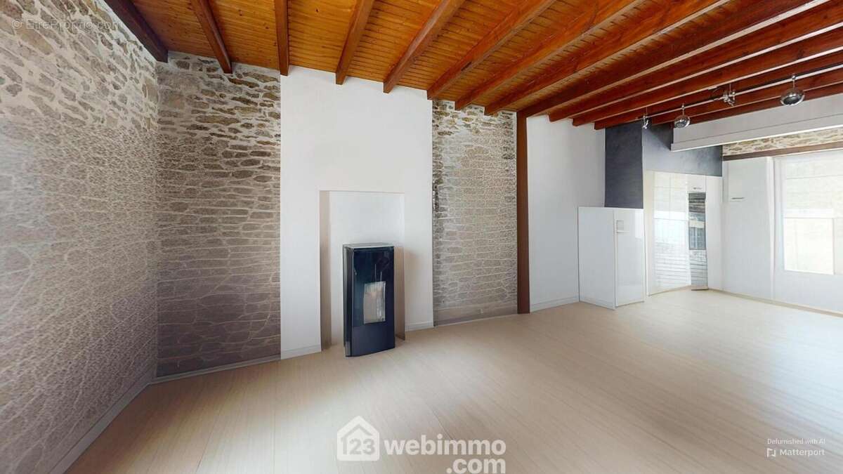 Salon avec poêle à granulés. - Maison à TALMONT-SAINT-HILAIRE