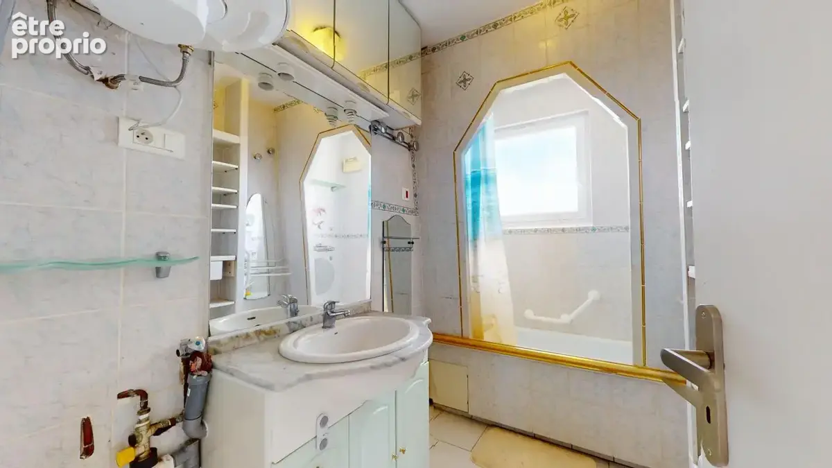 Appartement F3 de 62,43 m² avec balcons, cave et garage - photo 3