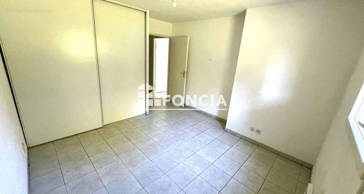 Exclusivite t2 de 43m2 en rdj avec balcon et parking - photo 4