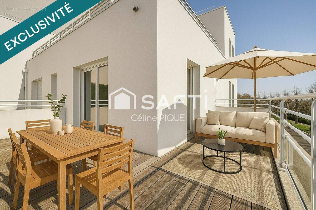 Photo 1 - Appartement à HEROUVILLE-SAINT-CLAIR