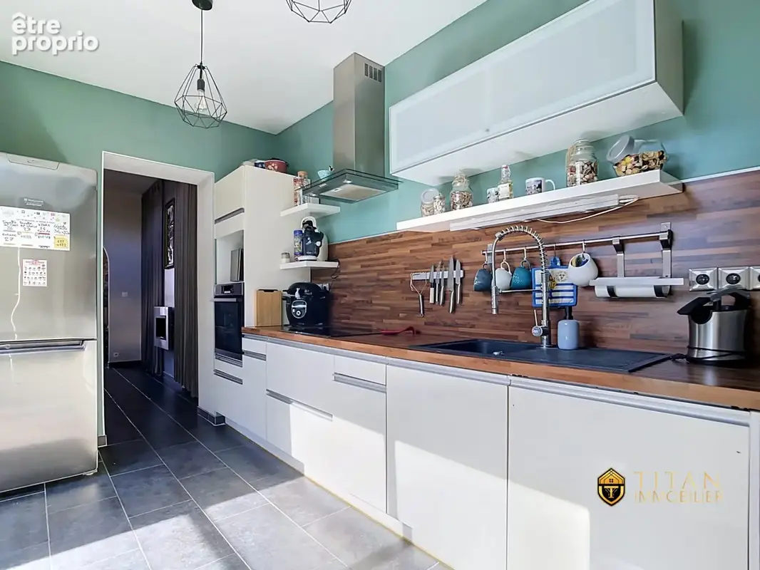 Maison mitoyenne de 132 m², 3 chambres, jardin à Coudekerque-Branche (59210)  - Titan Immobilier