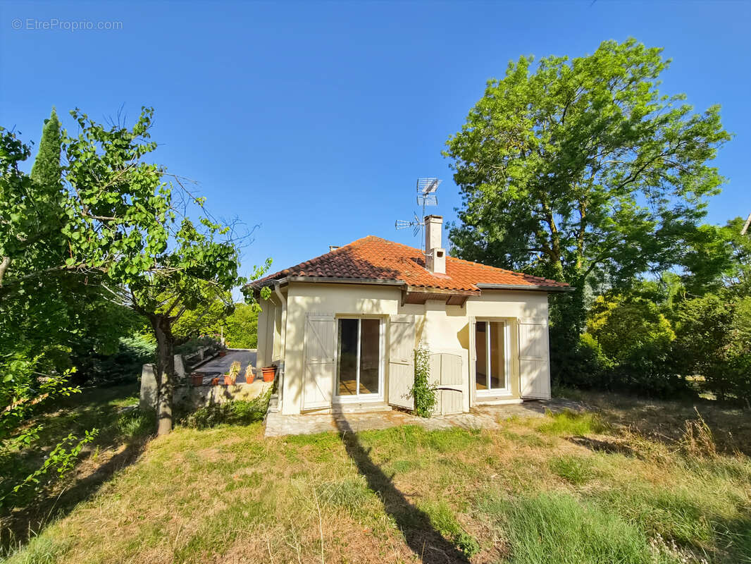 Maison T4 de 105m2 avec garage en sous-sol et jardin - Mauvezin - photo 3