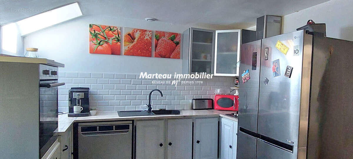 A VENDRE Longère rénovée de plain-pied avec piscine, grand terrain et beaux atoutsBrette Les Pins 5 pièce(s) 126 m2 - photo 5