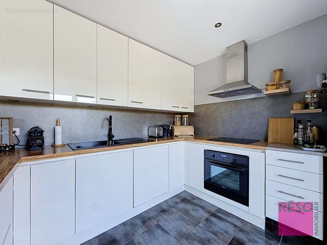 Maison 101 m² à Cranves-Sales  - photo 7