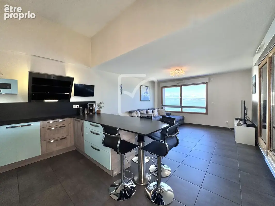 Appartement T4 de 90m2 pied dans l'eau - Amphion-Les-Bains - photo 5
