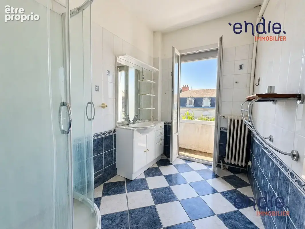 Appartement 4 pièces 137 m² à vendre à Moulins (03000) - photo 9