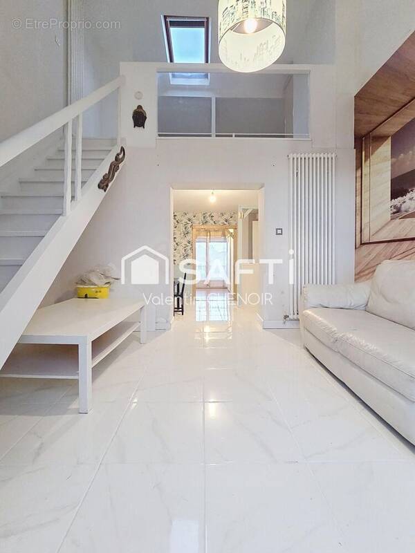 Photo 1 - Appartement à BOUGUENAIS