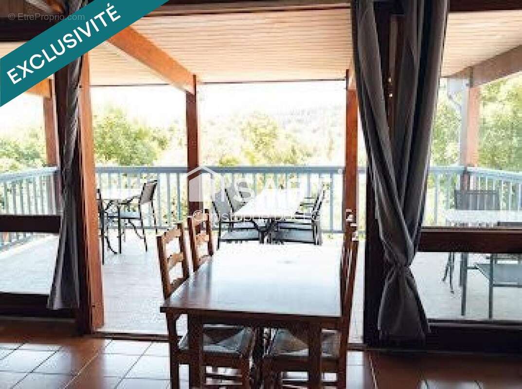 Photo 2 - Commerce à SAINT-GENIEZ