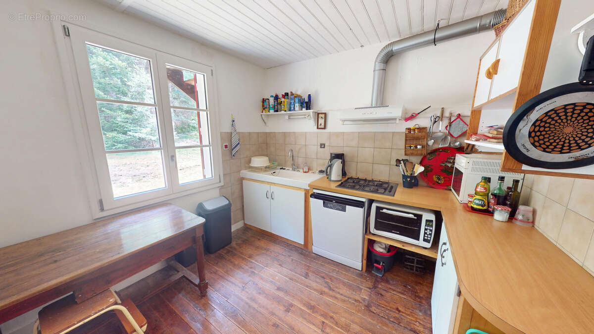 Chalet en bois sur sous sol et terrain attenant boisé - photo 10