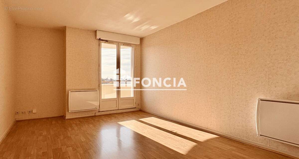 Appartement T2 avec parking et cave - photo 5