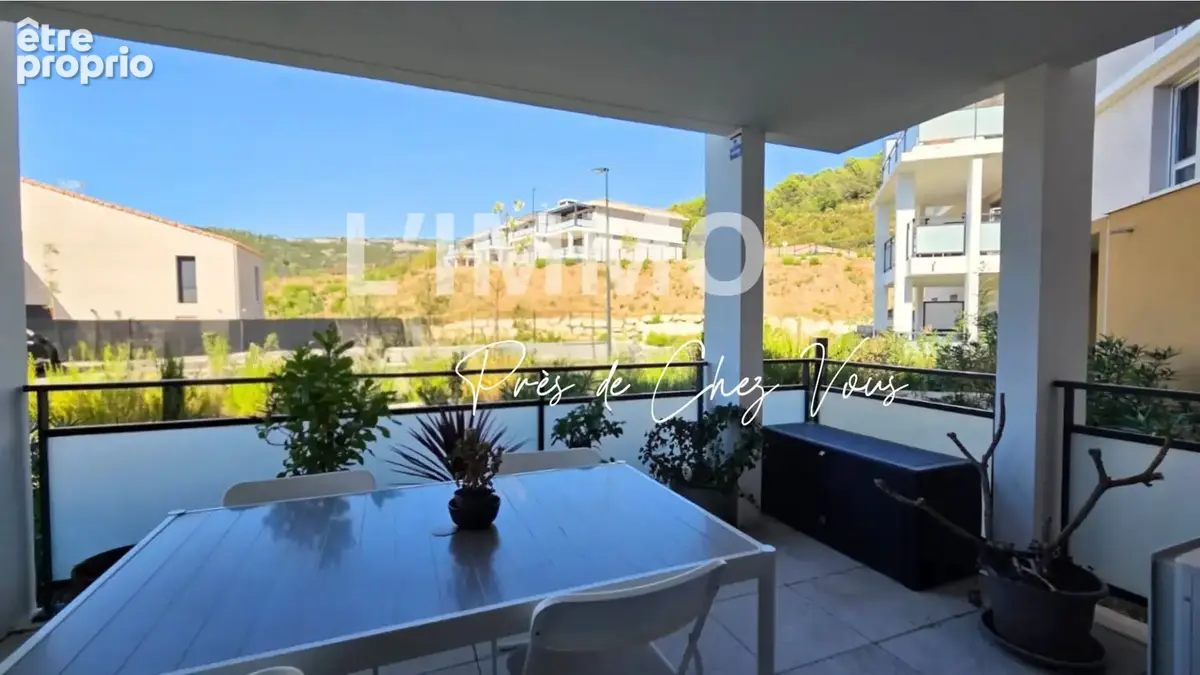 T3 67 m² avec grande terrasse, box et stationnement - photo 2