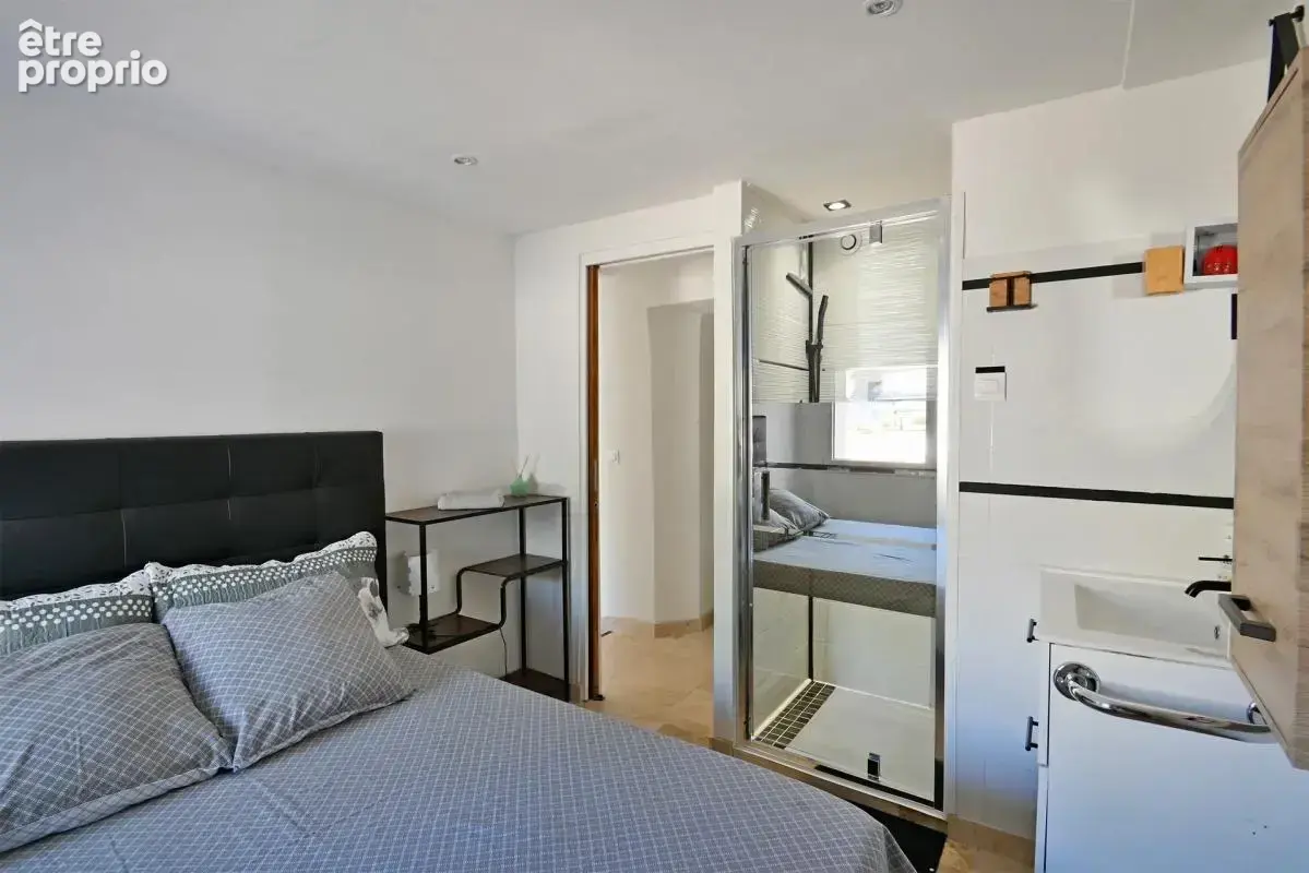 Maison de 5 pièces de 104 m² à Saint-Julien-les-Rosiers - photo 15
