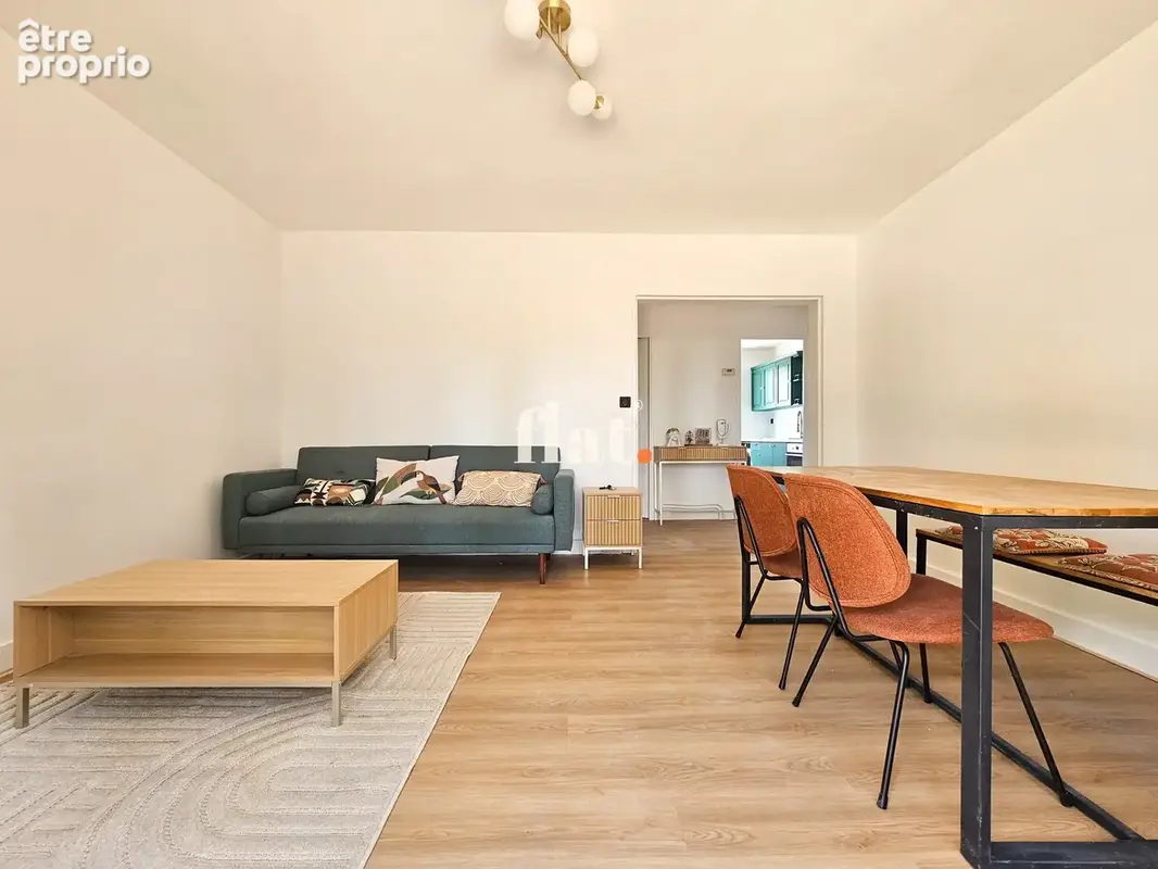 Appartement - 72 m2 - t4 (3ch) + parking + cave  - dpe d - photo 2