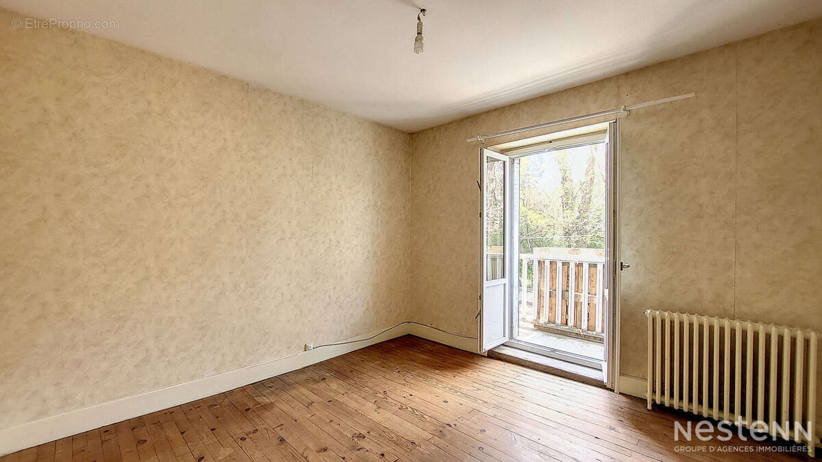 A Vendre Maison de 103 m² avec garages en sous-sol et jardin proche du chemin de Compostelle - photo 9