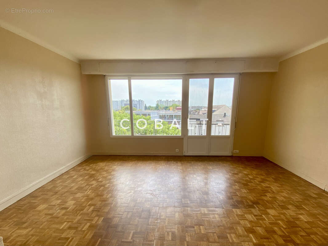 Appartement T4 spacieux avec balcon & vue dégagée - photo 2