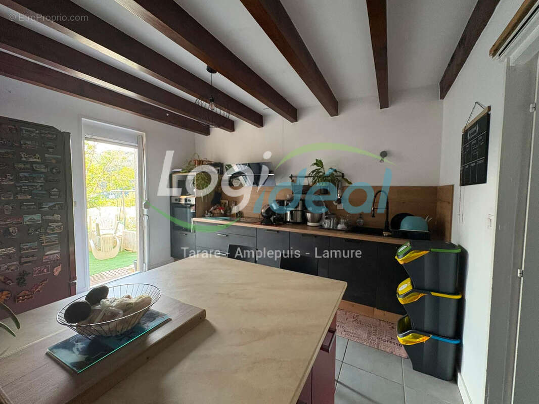 Maison 3 chambres en bon état avec garage et terrain. - photo 2