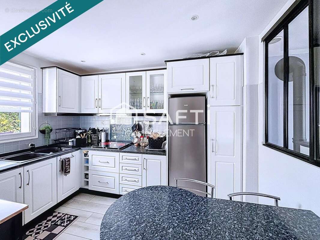 Photo 3 - Maison à BRIE-COMTE-ROBERT