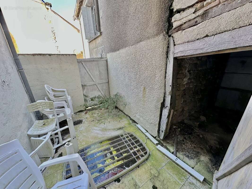 Charmante maison située en plein cœur du centre du village - photo 12