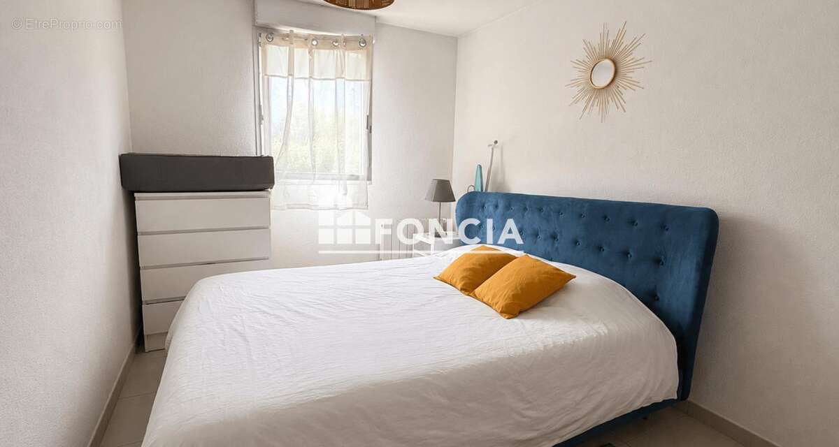 Appartement T3 avec balcon et 2 parking privatifs - photo 4