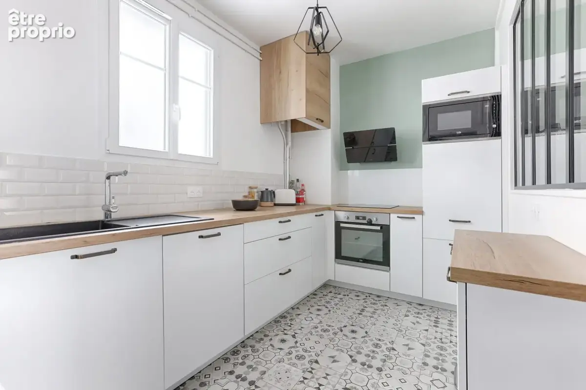 Appartement 3 pièces 65 m² à vendre à Courbevoie (92400) - photo 2